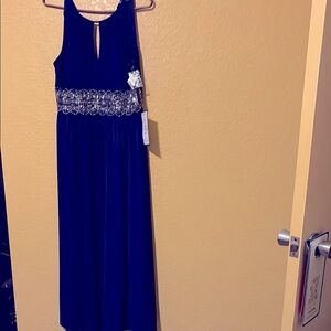 Elegant Blue women Dress with Silver Accents
Size 10p